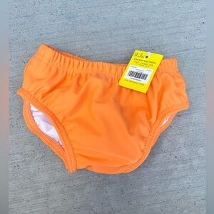 Primary NWT never been worn! Size 18-24 swim diaper.
